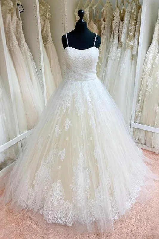 Elegant and noble tulle lace spaghetti strap fluffy and ground length wedding dress