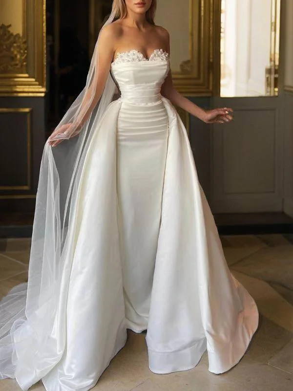 Tight off shoulder sweetheart beaded and ground length satin backless wedding dress